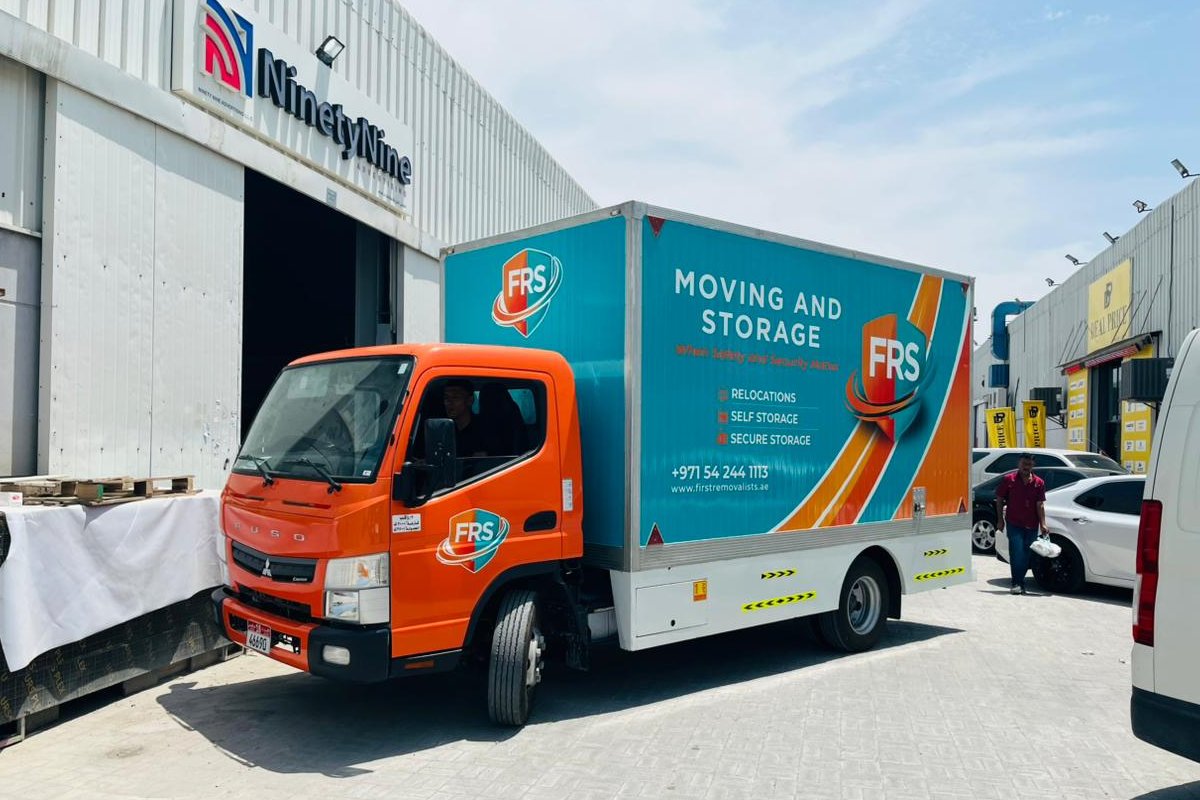 FRS Moving and Storage full truck branding on a Mitsubishi Fuso in Abu Dhabi