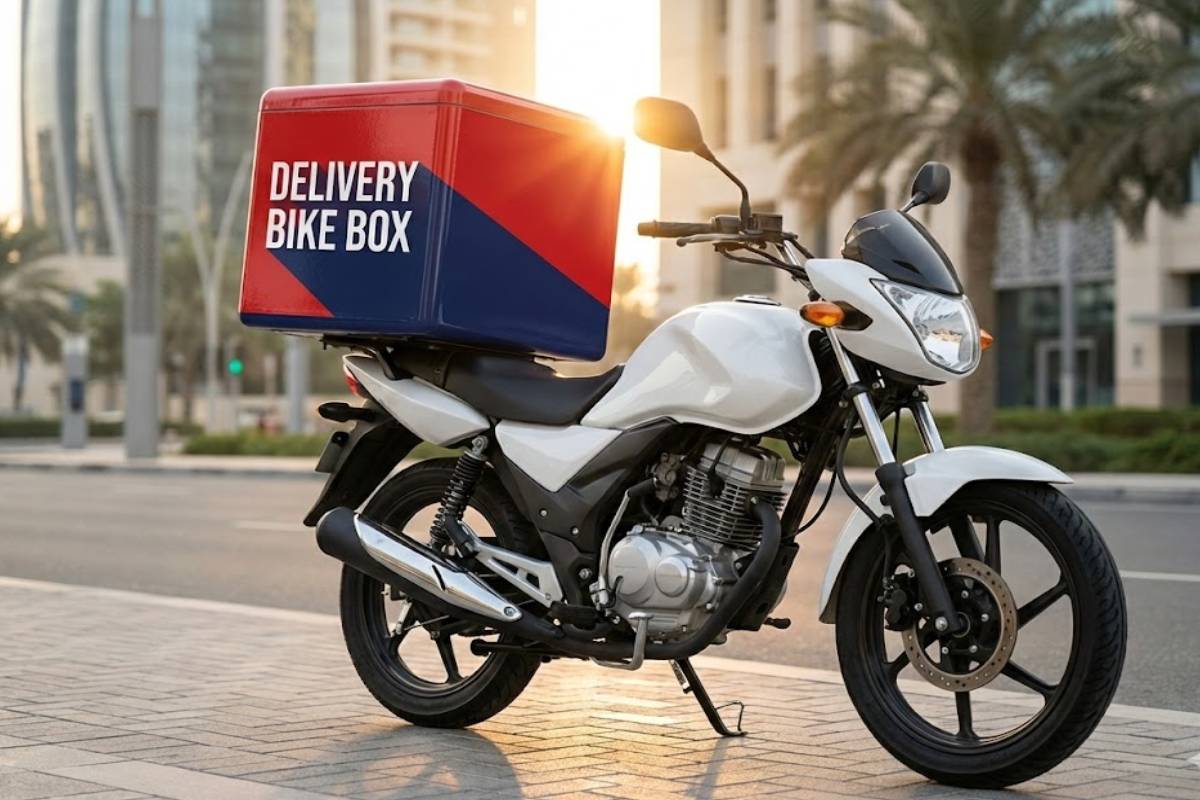 Reflective safety markings and branding on a delivery bike box, Abu Dhabi