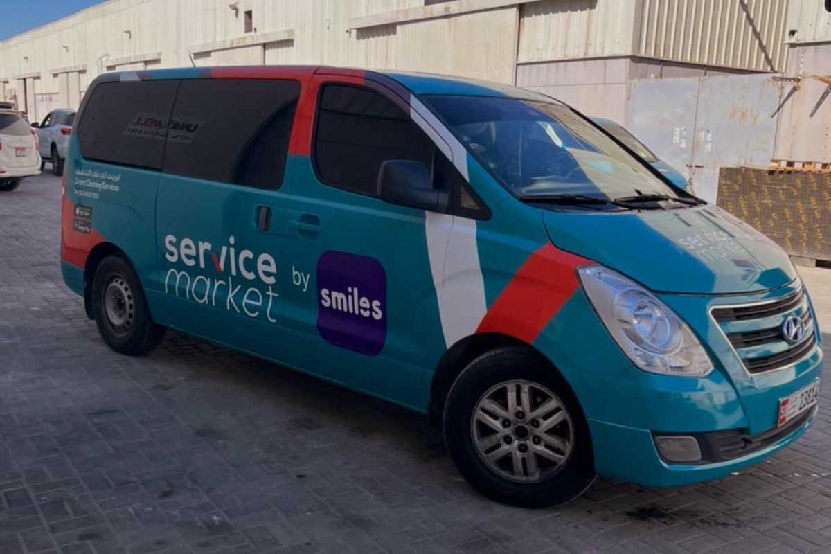 ServiceMarket by Smiles branded fleet vehicle in Abu Dhabi