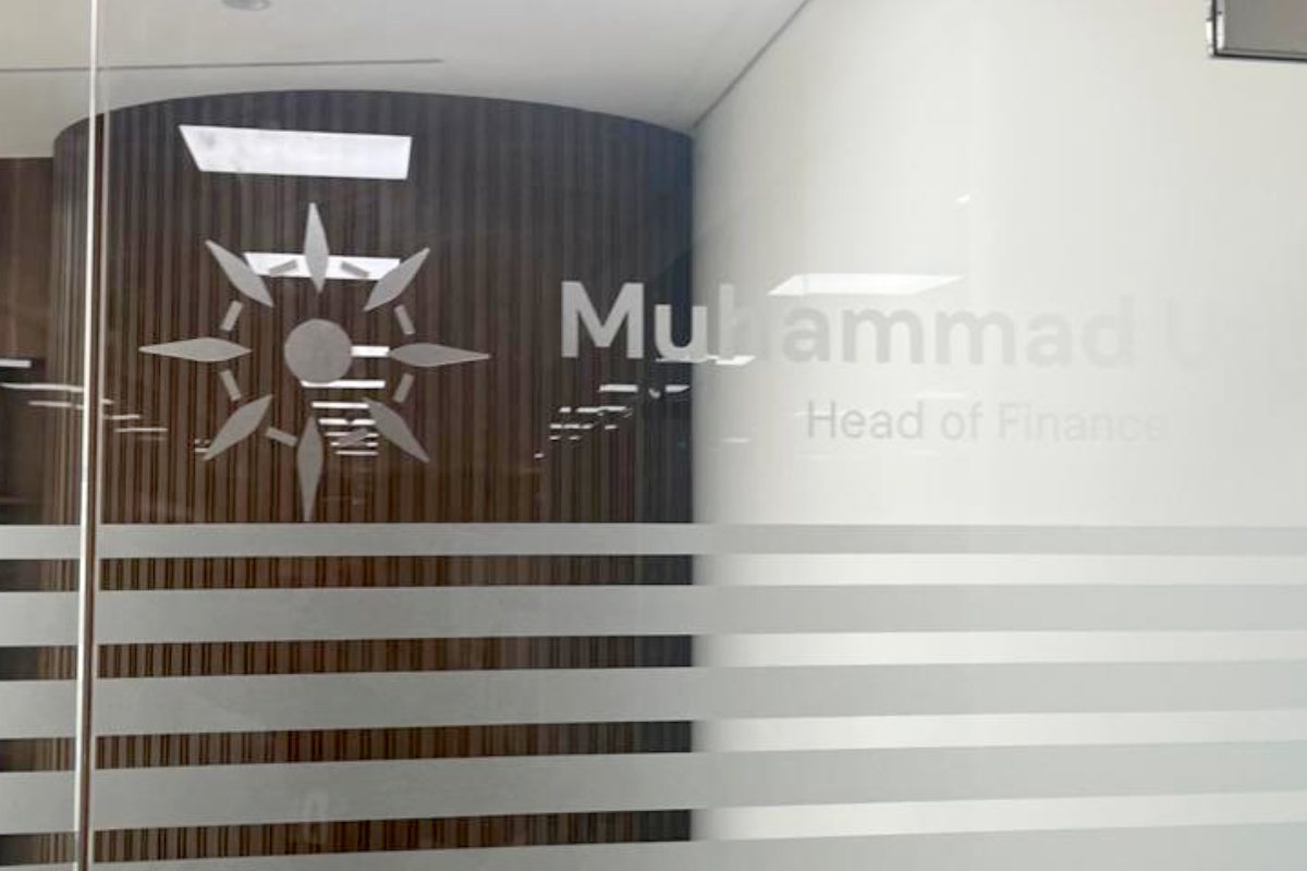 frosted glass sticker with logo cutoutout for ofco abu dhabi