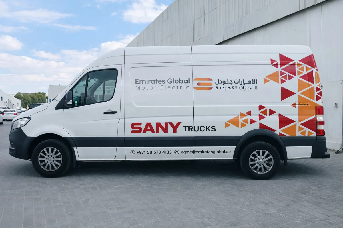Partial fleet branding for Al Fahim Sany Electric Vehicle trucks featuring high-durability industrial vinyl graphics.