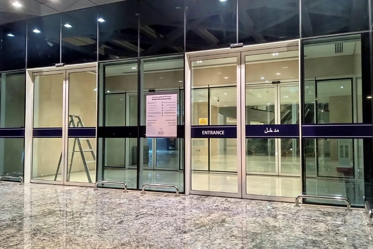 Entrance and exit vinyl decals on retail glass doors