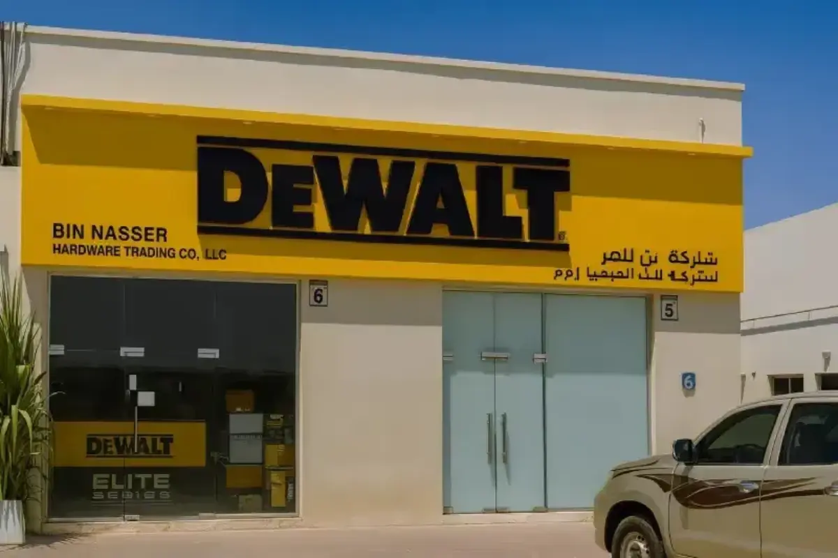 Professional signage installation in Abu Dhabi featuring a 3D signboard of DeWalt done By Ninety Nine Advertising LLC