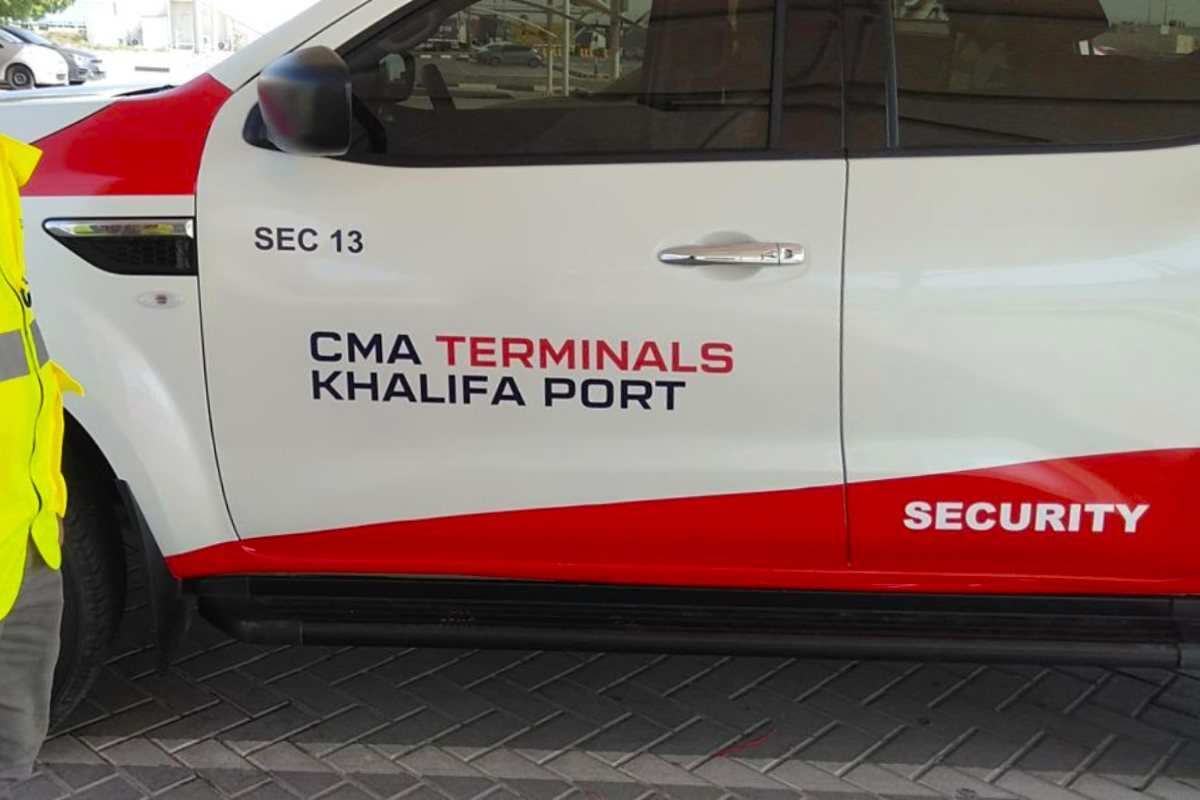 CMA Terminals partial vehicle branding on a pickup at Khalifa Port, Abu Dhabi