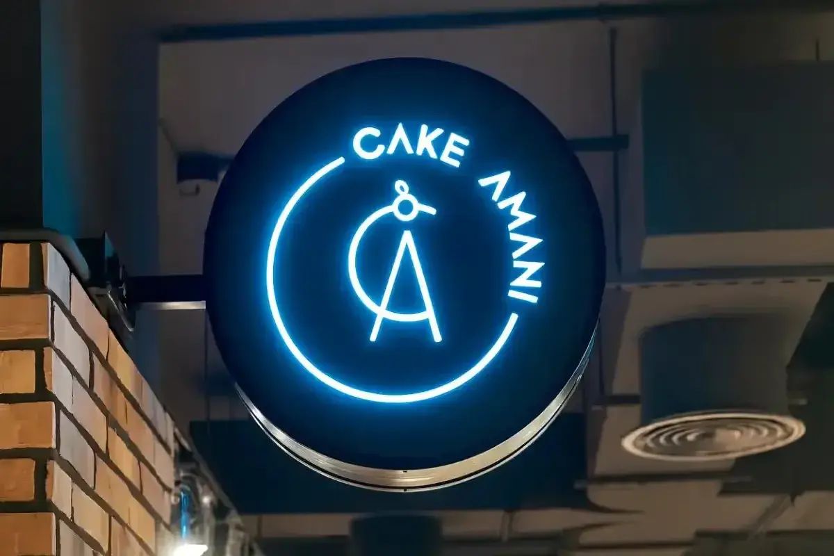 double-sided-illuminated-circular-blade-sign-for-cake-amani-bakery