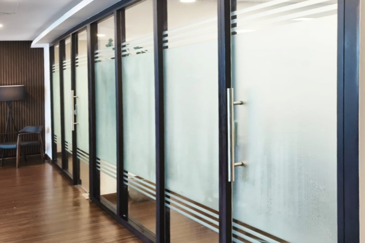 Side view of Privacy frosted glass sticker in Abu Dhabi by Ninety Nine Advertising LLC