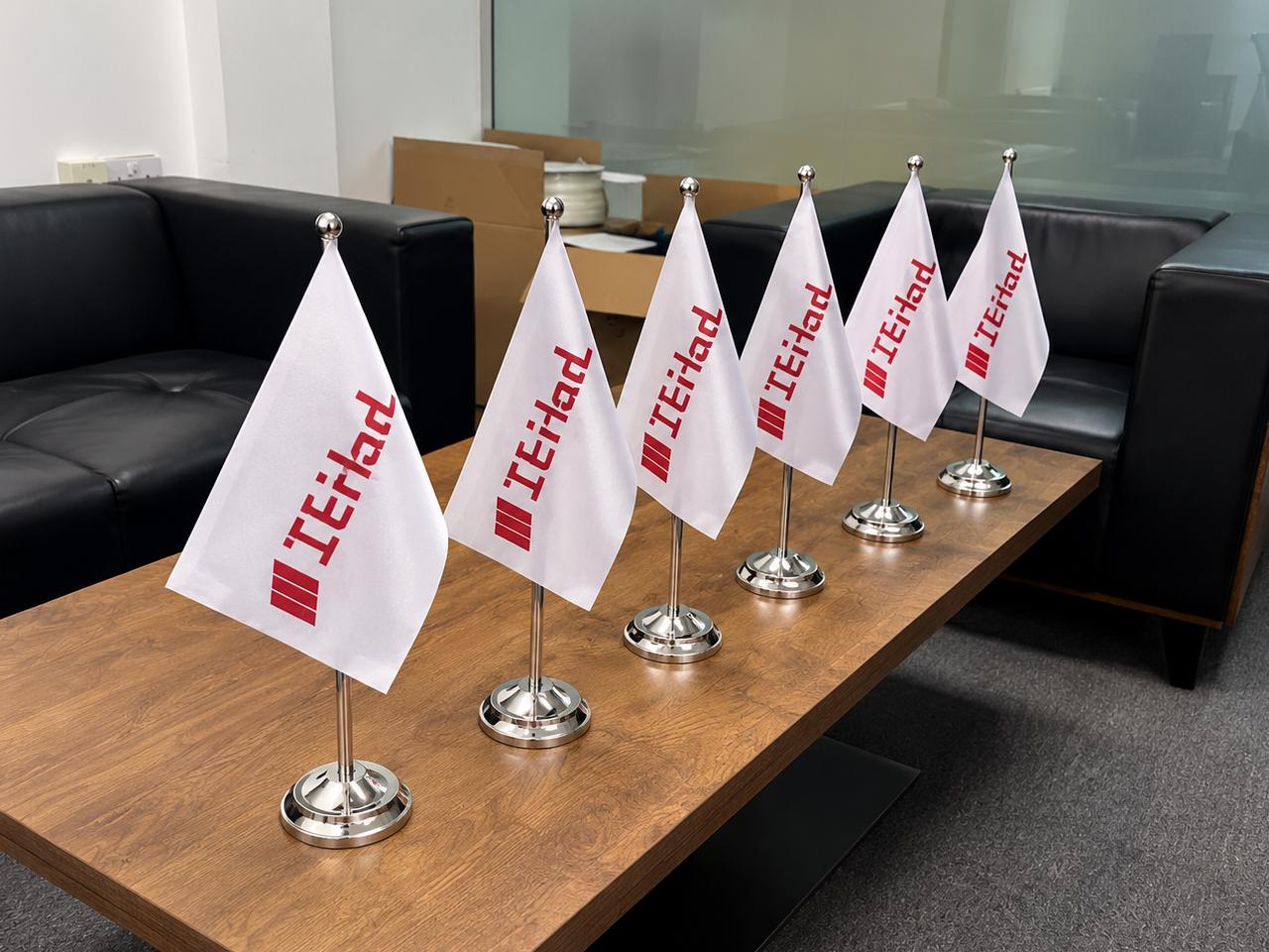 table flag with silver base and pole for Etihad Investment