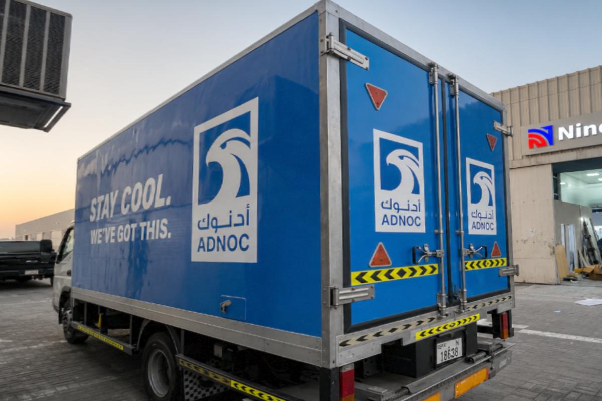 ADNOC box truck side and rear branding in Abu Dhabi
