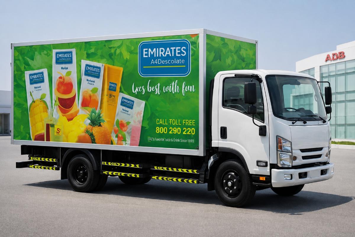 Emirates Food box truck branding with juice product graphics on an Isuzu truck in Abu Dhabi