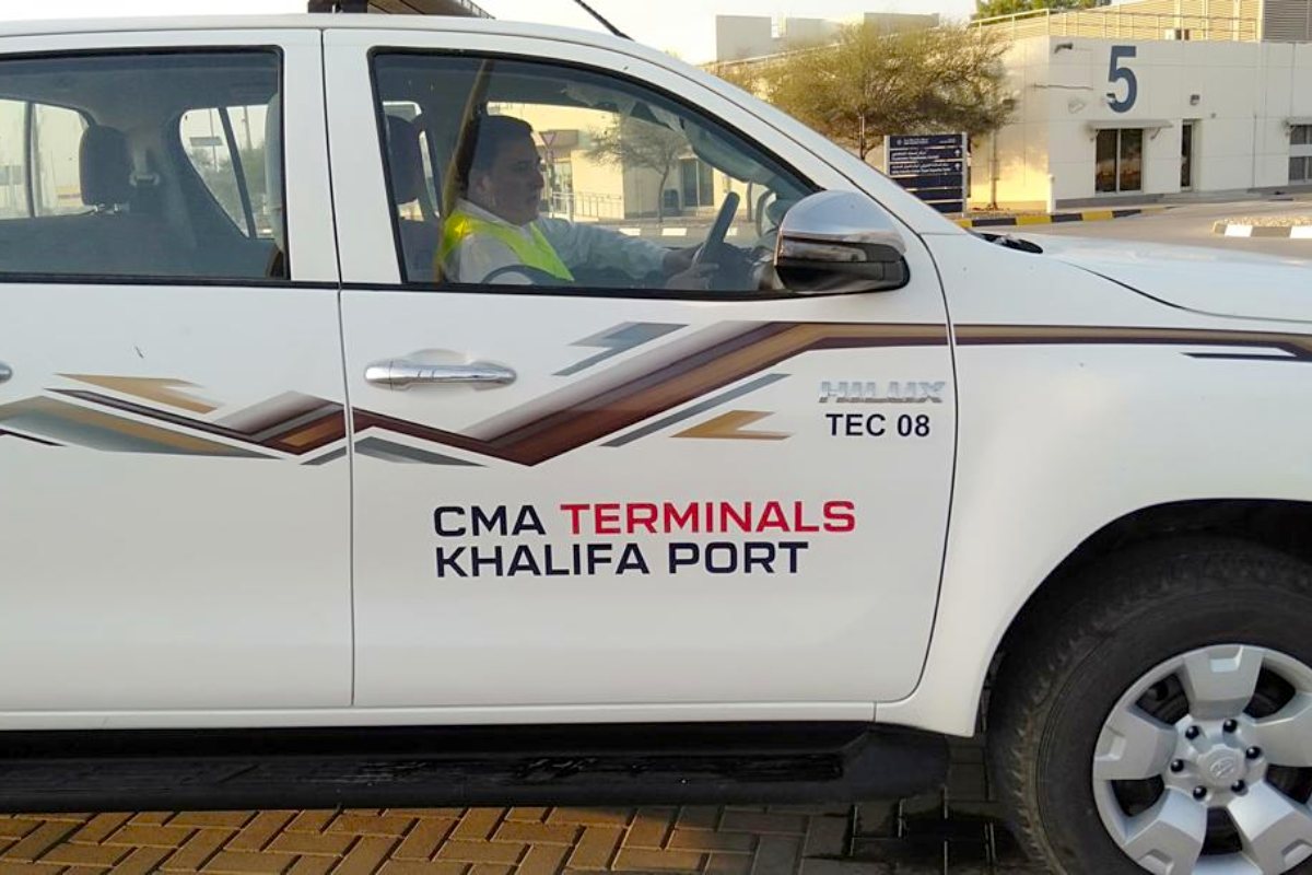 CMA Terminals vinyl cut lettering on a pickup, Abu Dhabi