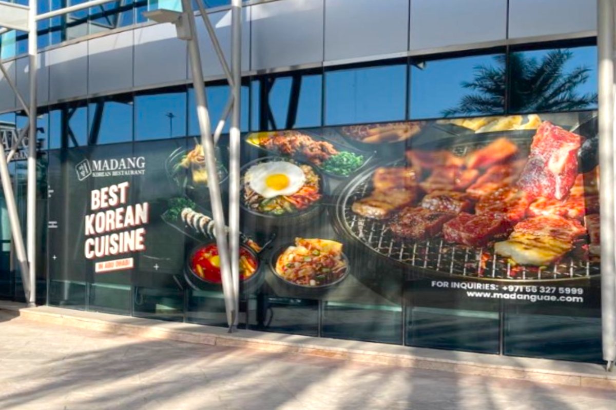 window branding for retail restaurant shopfront in Abu Dhabi Airport road