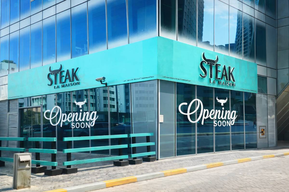 Window vinyl Lettering for storefront showing opening soon at Al Muroor Area in Abu Dhabi